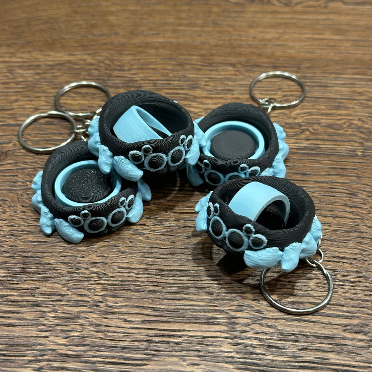 Spinnende spinnen sleutelhanger